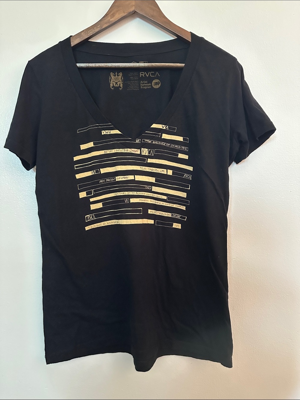 RVCA Black V-Neck Tee with Gold Stripe Graphic